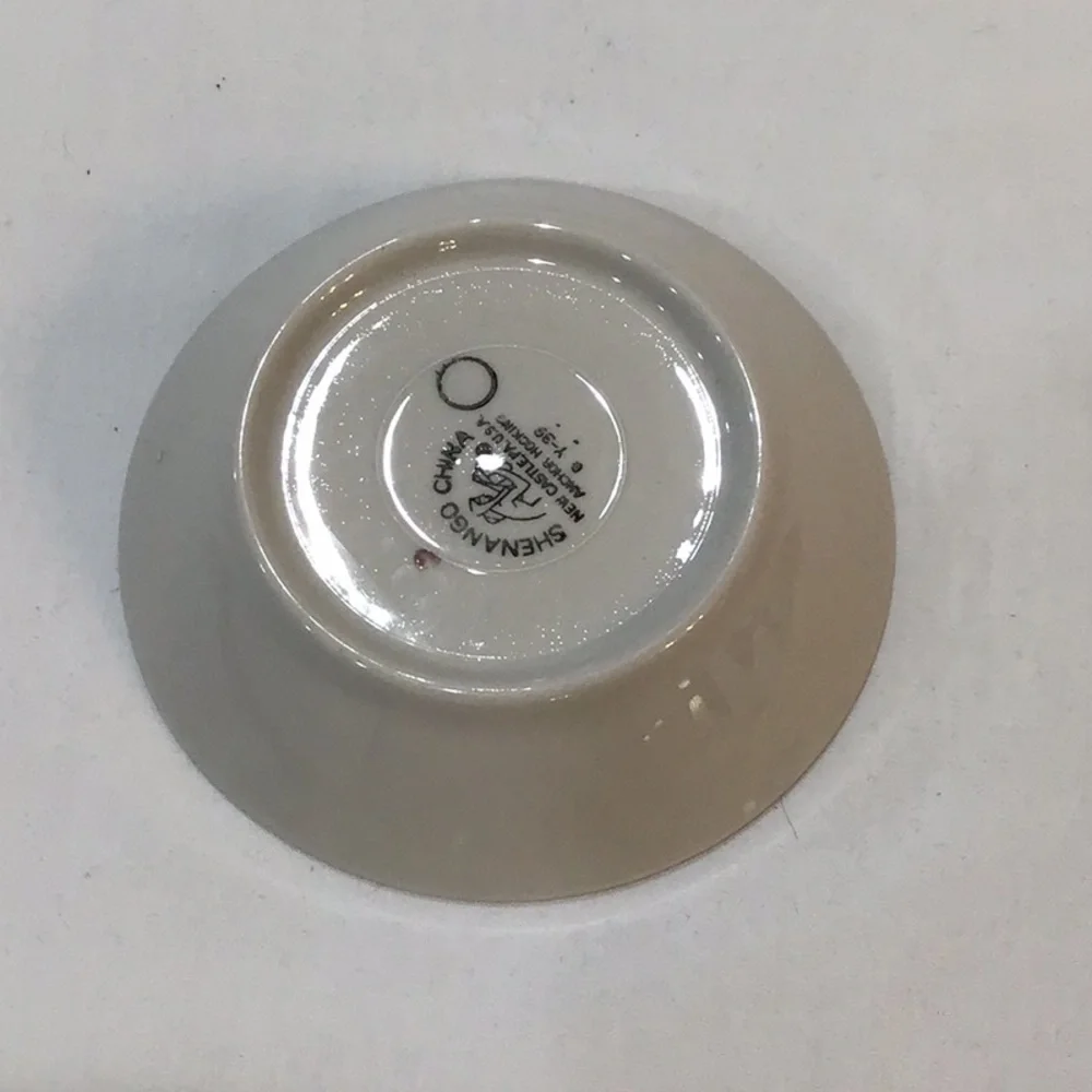 Monkey bowl trimmed in gold, Made in the Shenango Valley, Pennsylvania USA